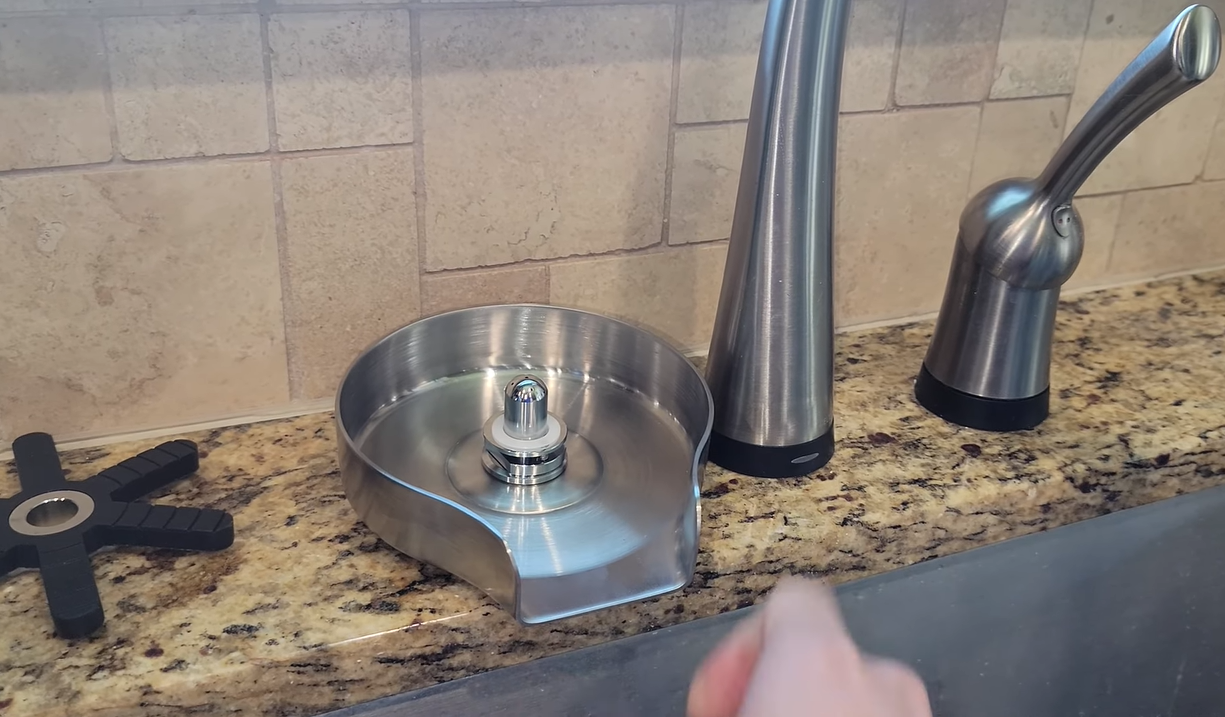 How to install glass rinser for kitchen sink?